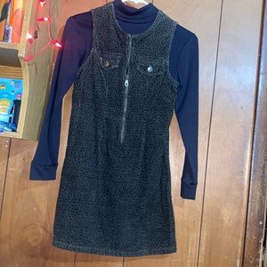 Black and brown cheetah print dress long black under sleeve.